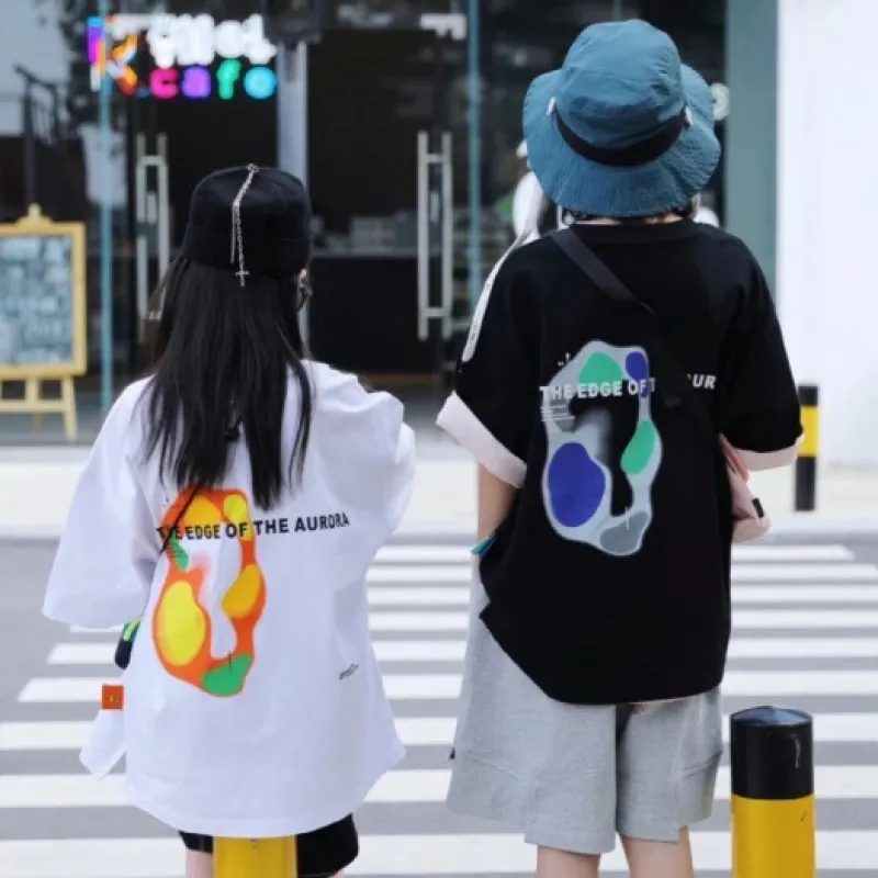 【100-160 cm】ゆったり コットン おしゃれ 落書き プリント 半袖 夏 子供服 キッズ ジュニア 女の子 トップス Tシャツ カットソー